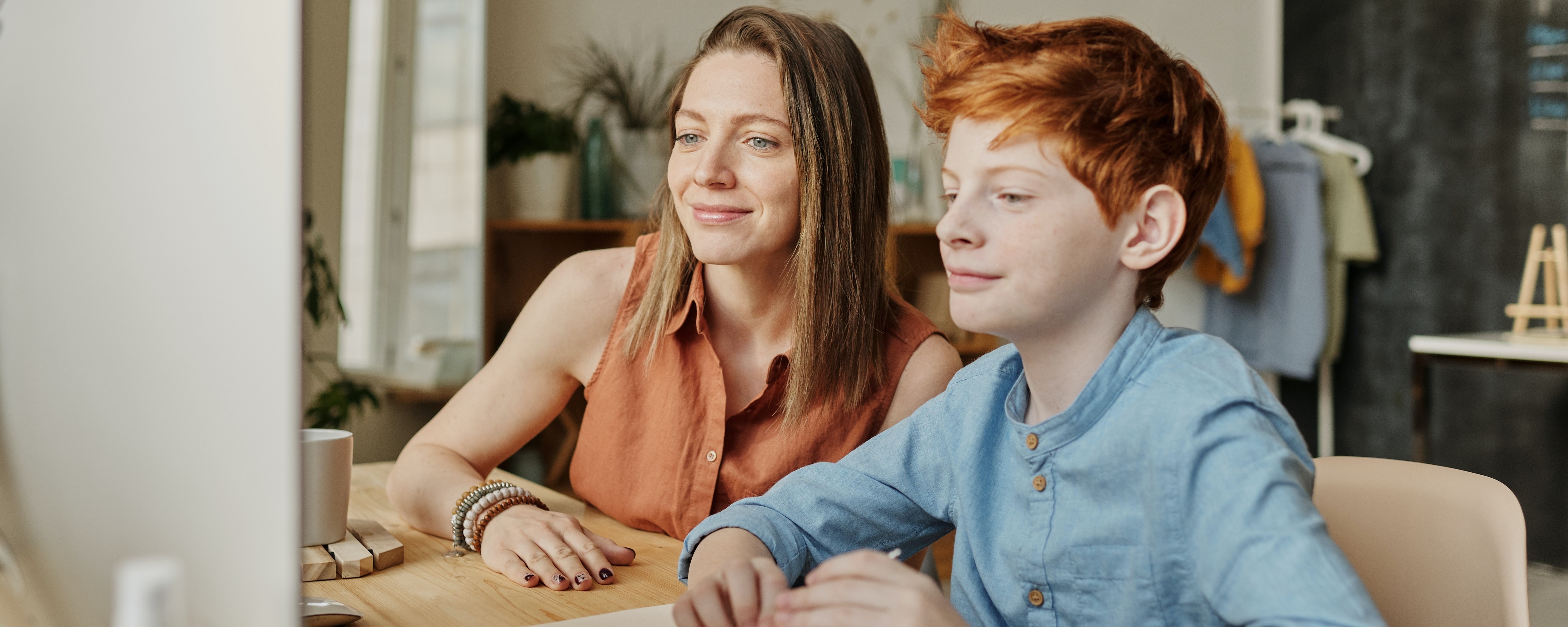 Lady teaching son